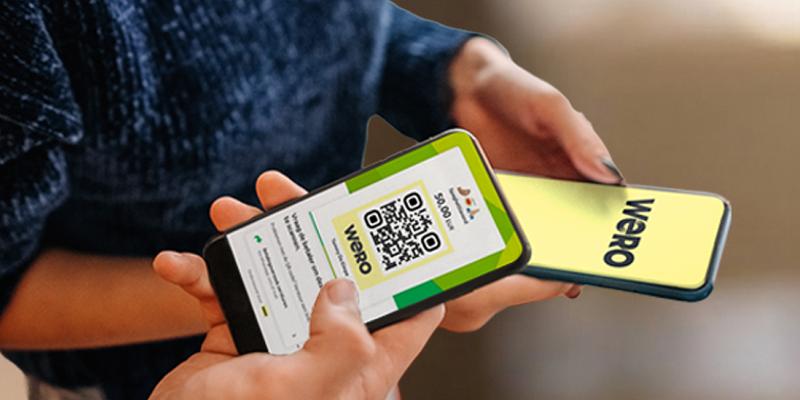 Een contactloze betaling tussen 2 smartphones via Wero